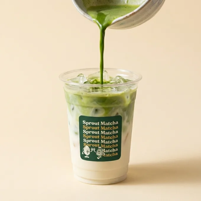 Ceremonial matcha poured on tap from a bowl into an iced Sprout Matcha cup